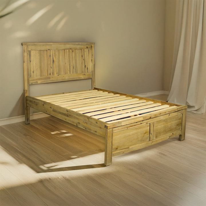 The front of the Mars King Single Slat Bed Frame in a warm, modern bedroom.