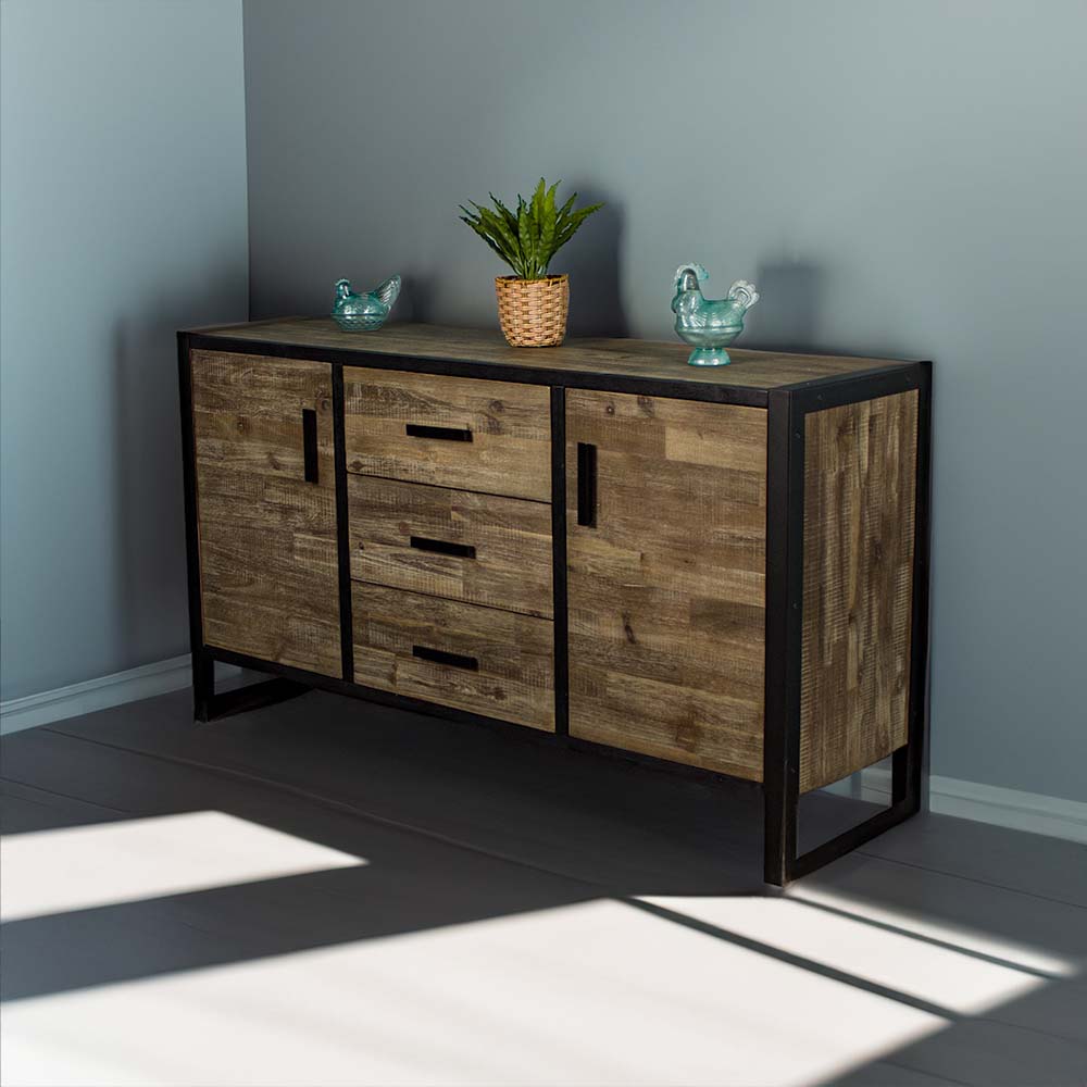 The front of the Victor 2 Door 3 Drawer Sideboard. There are two blue glass ornaments on top with a small potted plant in between.