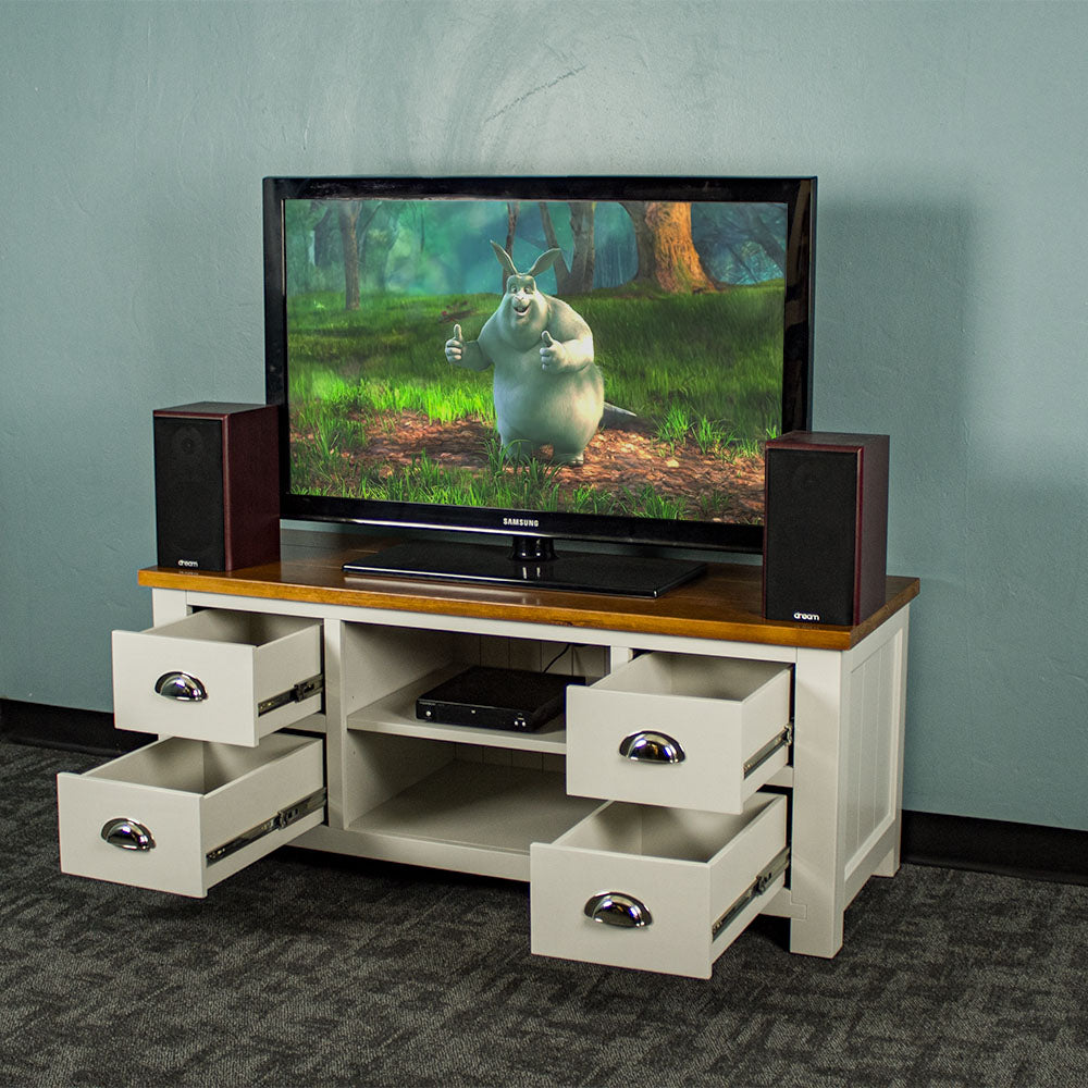 The front of the Alton Entertainment Unit with its drawers open. There are two speakers with a TV in between. There is a DVD player on the top shelf in the middle.