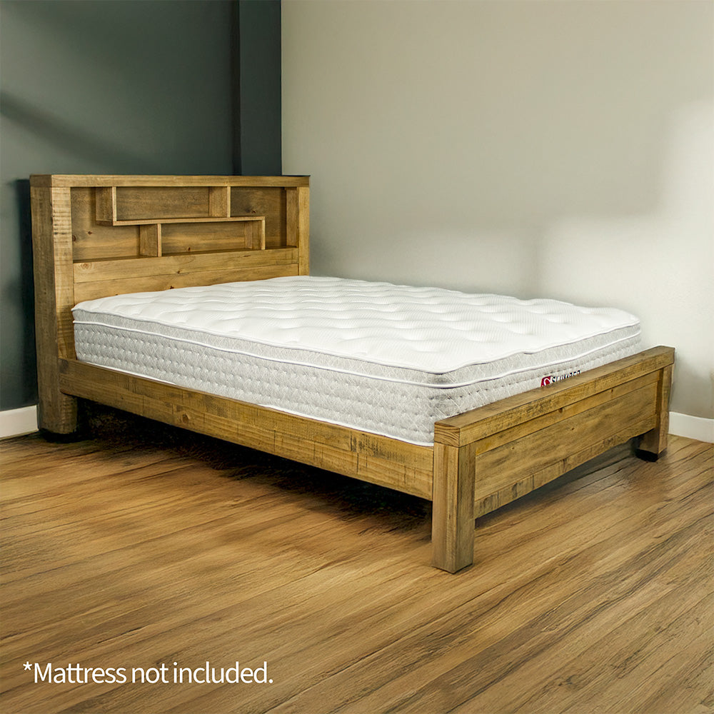 The front of the Amarillo Queen Slat Bed Frame with a mattress on top, in a modern bedroom.