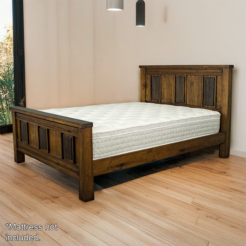 The front of the Botanica King Slat Bed Frame, with a mattress on top (not included).