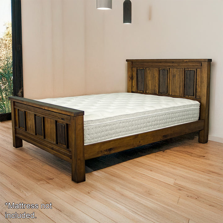 The front of the Botanica King Slat Bed Frame, with a mattress on top (not included).