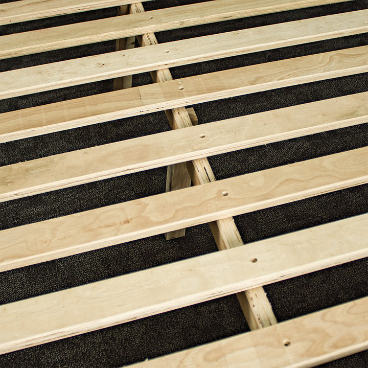 A close up of the wooden support bar underneath the slats of the Mars Queen Slat Bed Frame.