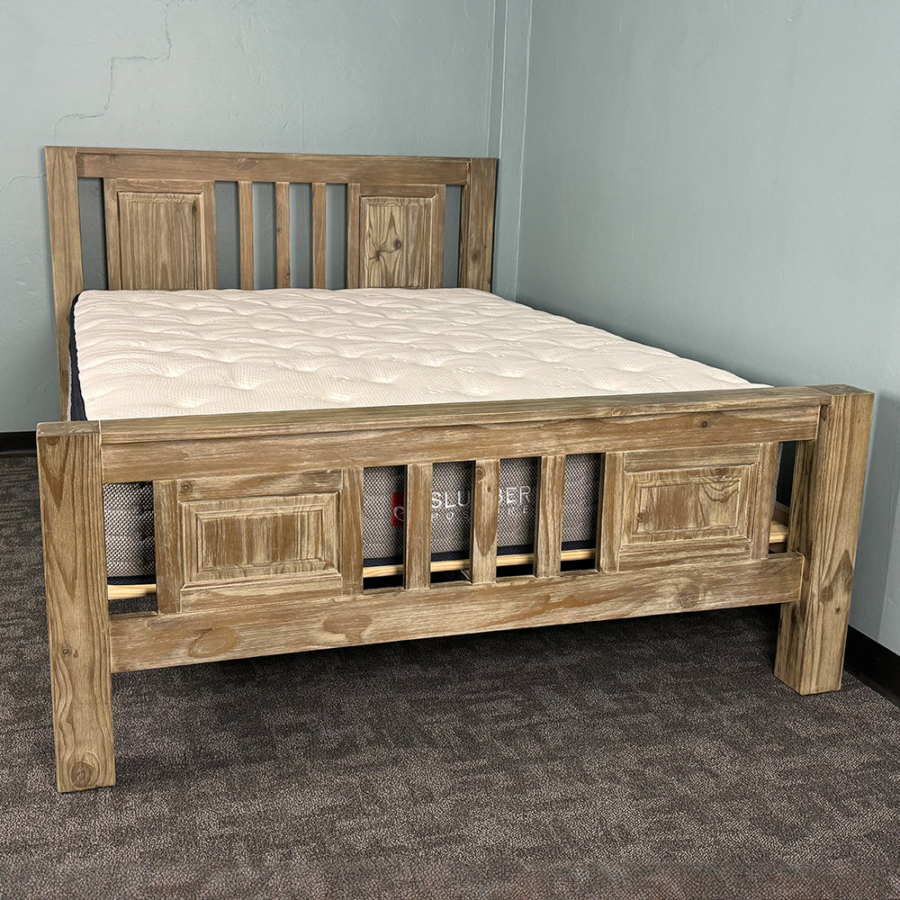 The front of the Vancouver King Size Slat Bed Frame with a mattress on top.