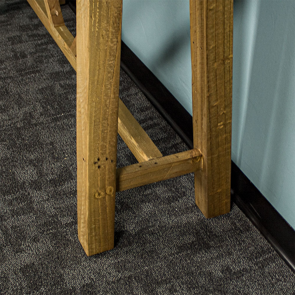 Close up of the legs of the Ventura Recycled Pine Hall Table. The support braces can also be seen.