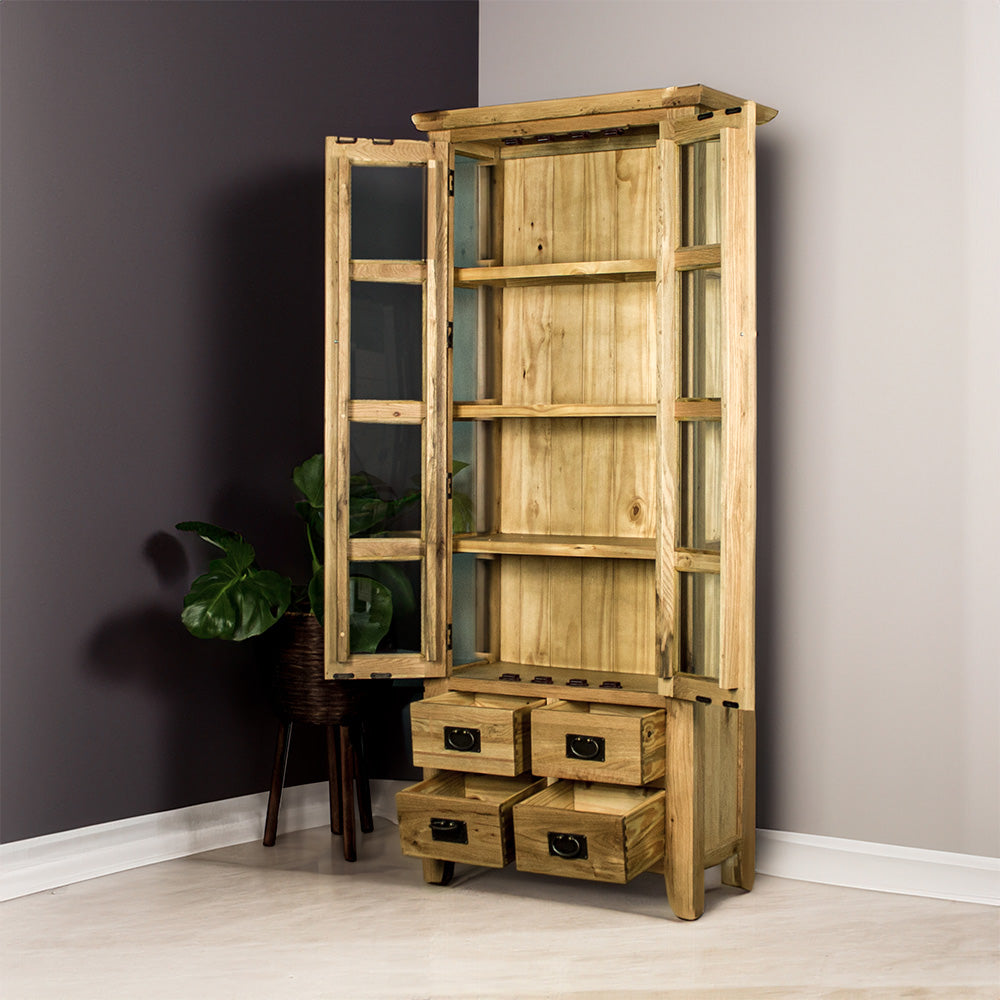 An overall view of the Yes 2 Door 4 Drawer Glass Display Cabinet with its doors and drawers open. There is a free standing potted plant next to it.