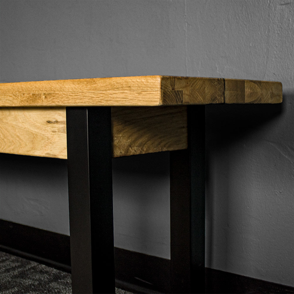 The side/end of the Golden Gate Long Oak Bench.