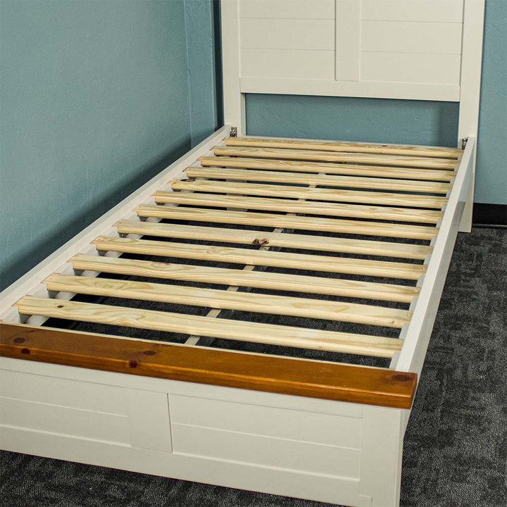 The slats of the Alton Single NZ Pine Slat Bed Frame.