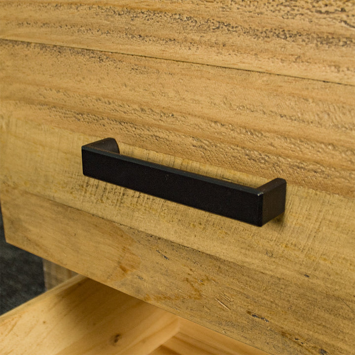 A close up of the black handle on the drawers of the Amarillo Two Drawer Bedside.