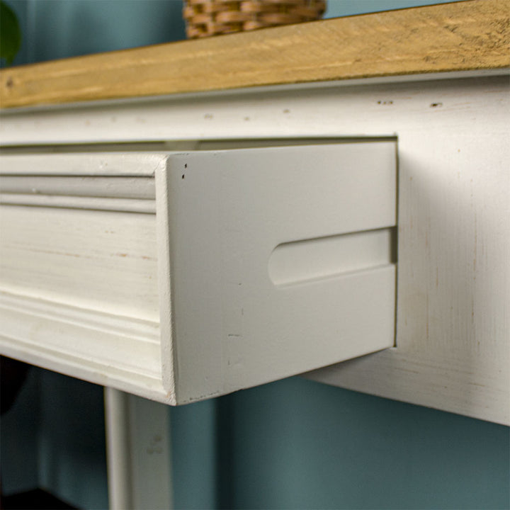 Side of the drawer of the Byron Recycled Pine Hall Table showing the free flowing runners.