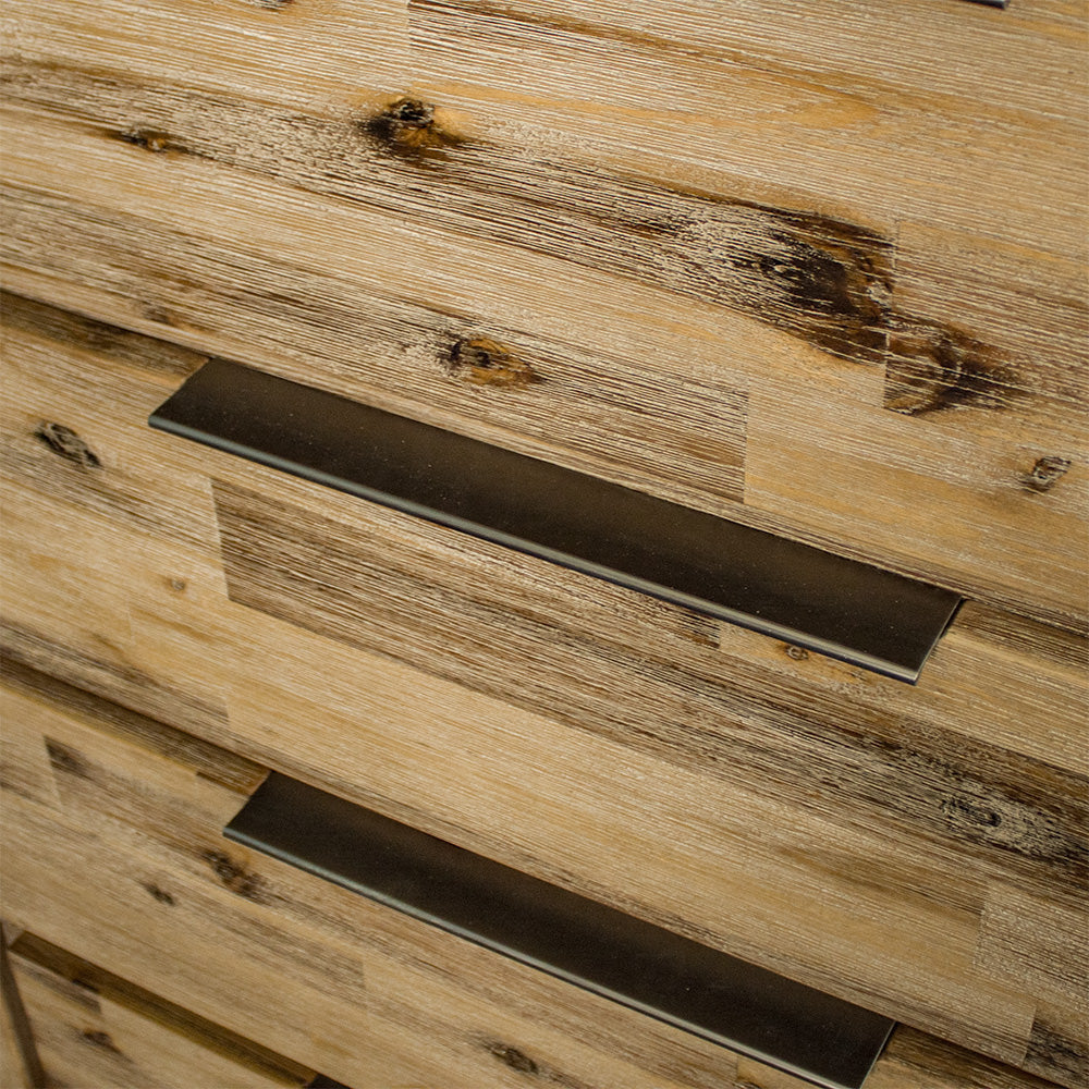 A close up of the black metal handles on the drawers of the Mars Four Drawer Tallboy.