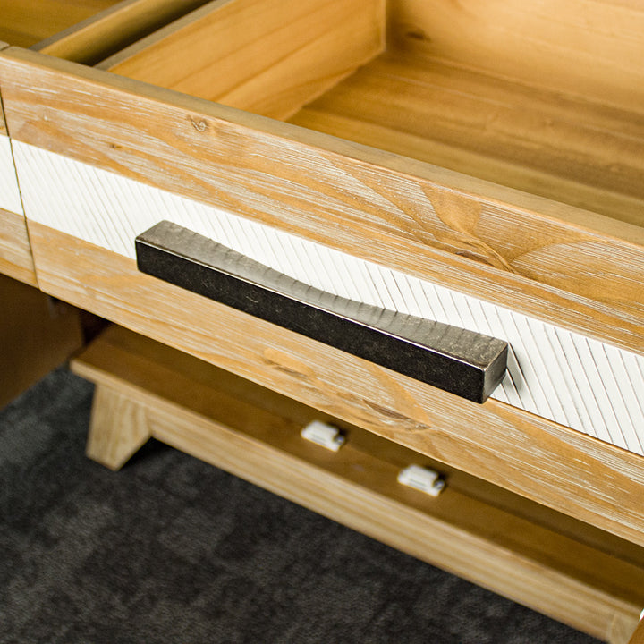 A close up of the black metal handle on the drawers of the Soho 2 Door 2 Drawer NZ Pine Buffet Sideboard