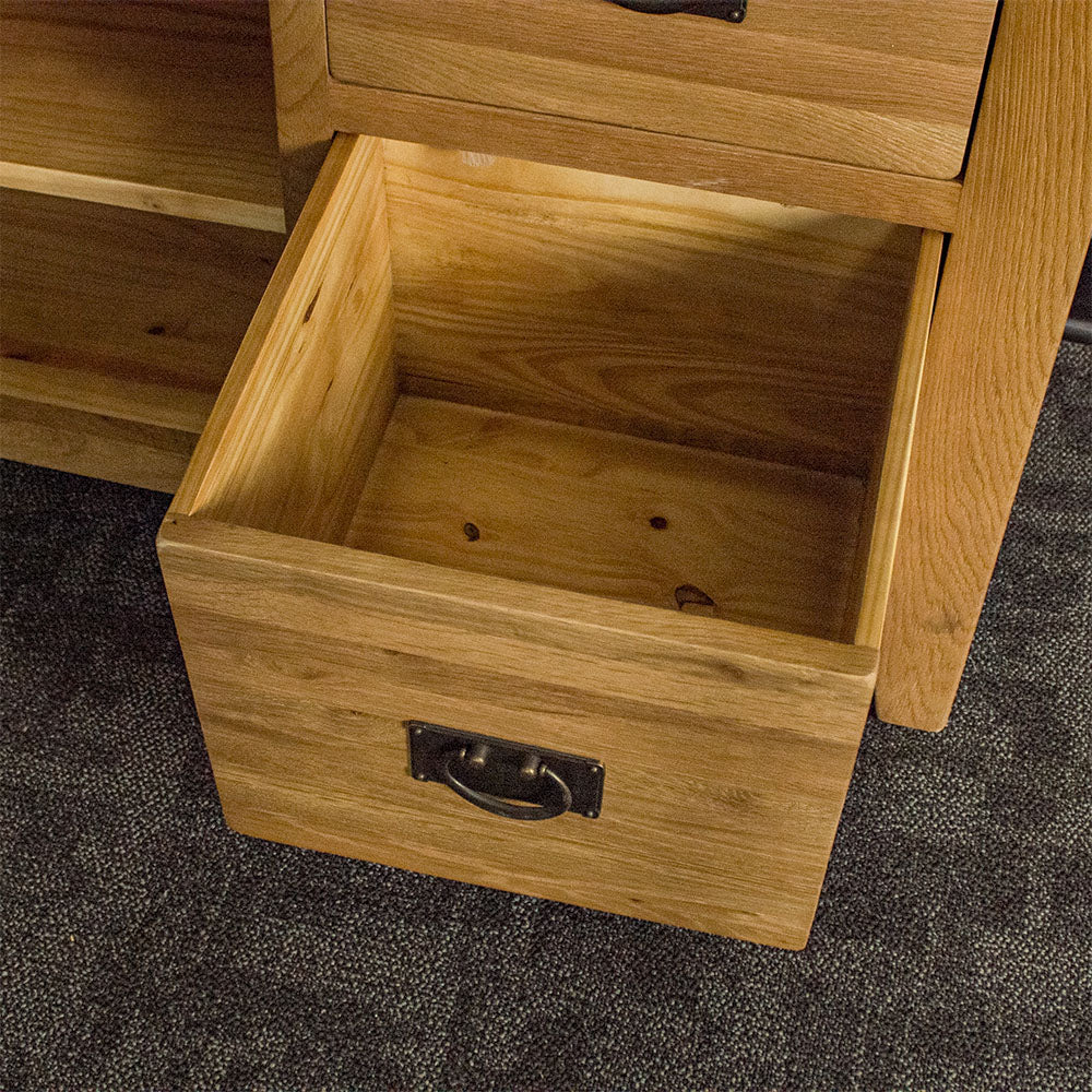 The drawer of the Yes Compact 1 Door 3 Drawer Oak Buffet. 