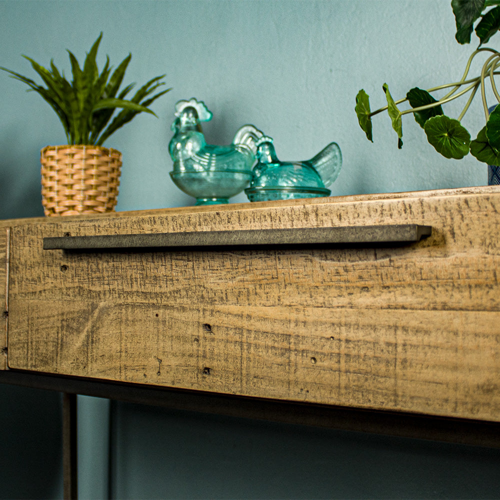 A close up of the brushed metal handles on the drawers of the Monterey Recycled Pine Hall Table.