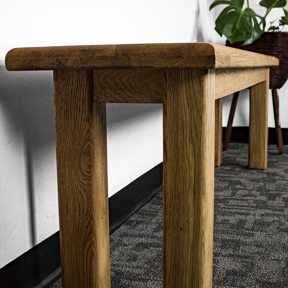 A closer view of the legs on the Loire Solid Oak Bench Seat 1.8m.