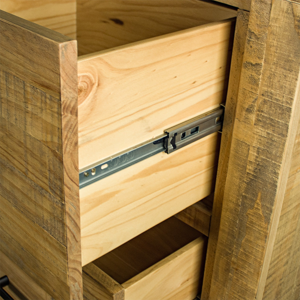 A close up of the smooth metal runners on the drawers of the Amarillo Seven-Drawer Tallboy.