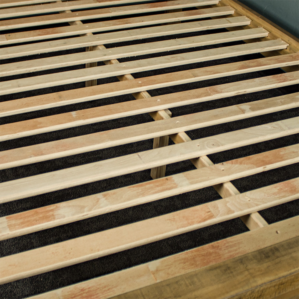 A close view of the slats of the Amarillo Queen Slat Bed Frame.