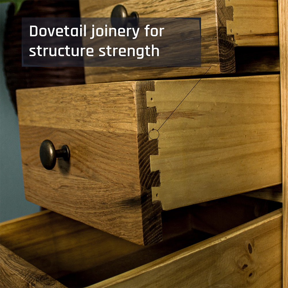 A close up of the side of the drawers on the Beethoven Oak Bedside Table with 3 Drawers, which features strong dovetail joinery.