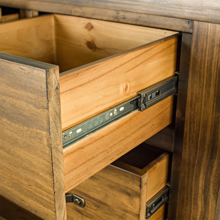 A close up of the runners on the drawers of the Botanica Six Drawer Tallboy.