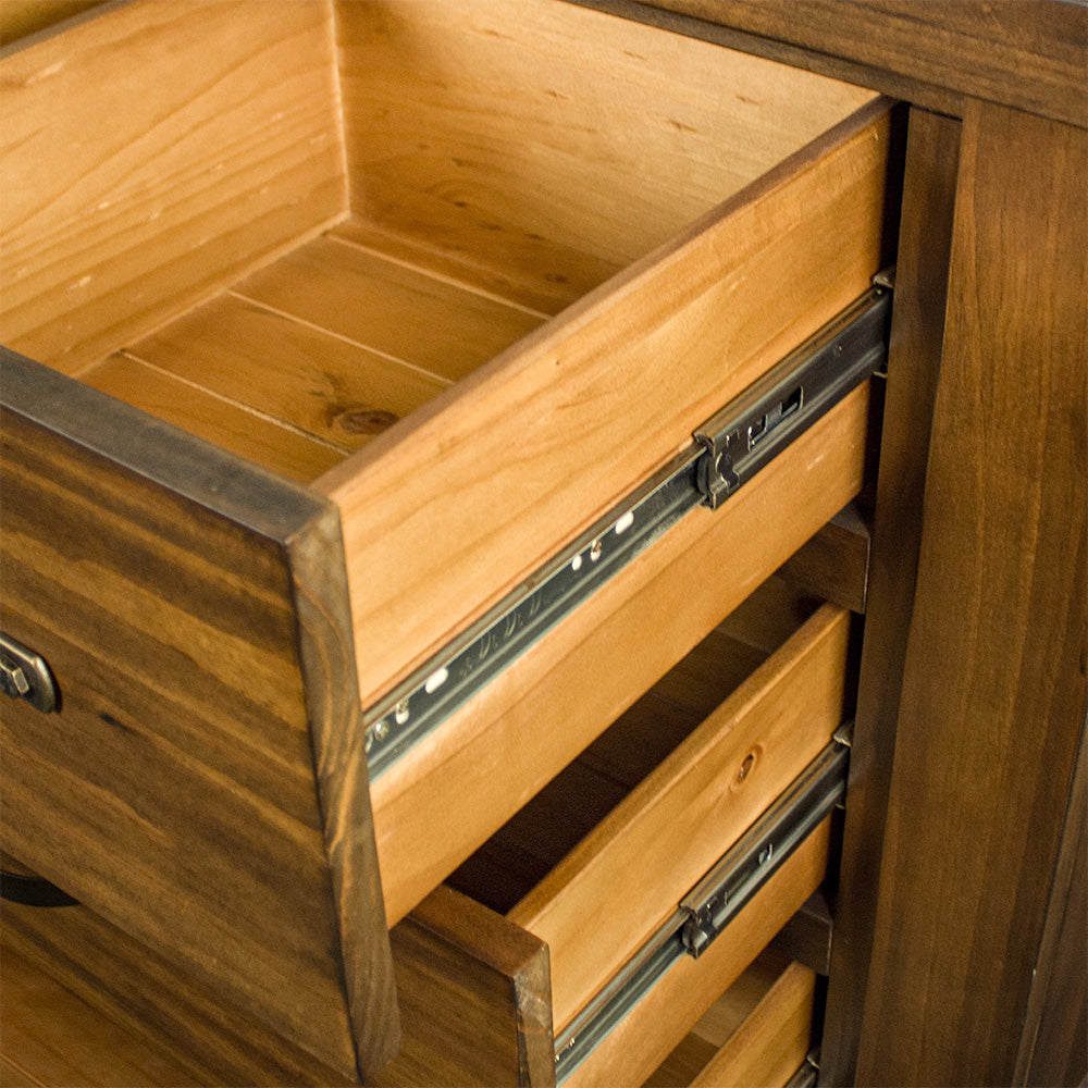 A close up of the runners on the drawers of the Botanica Large Seven Drawer Lowboy.