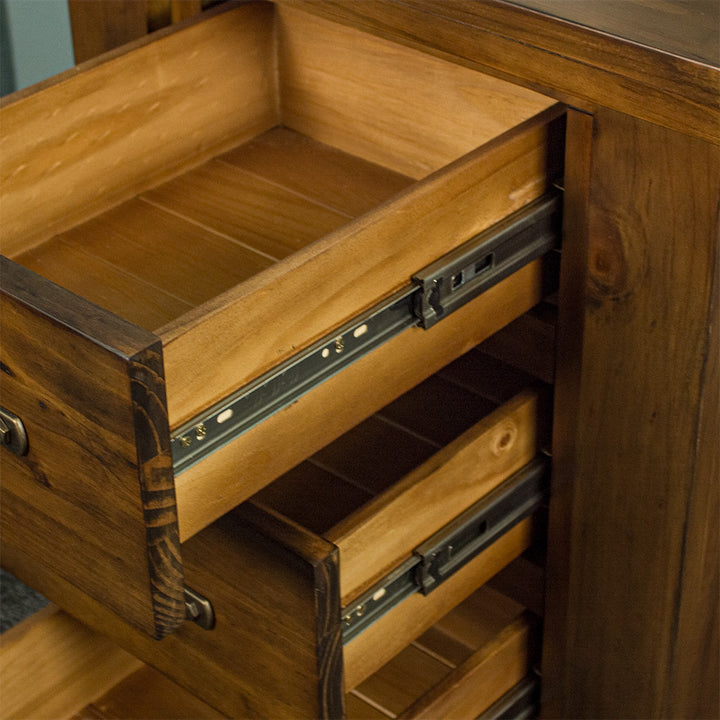 A close up of the smooth metal runners on the drawers of the Botanica Bedside Cabinet.