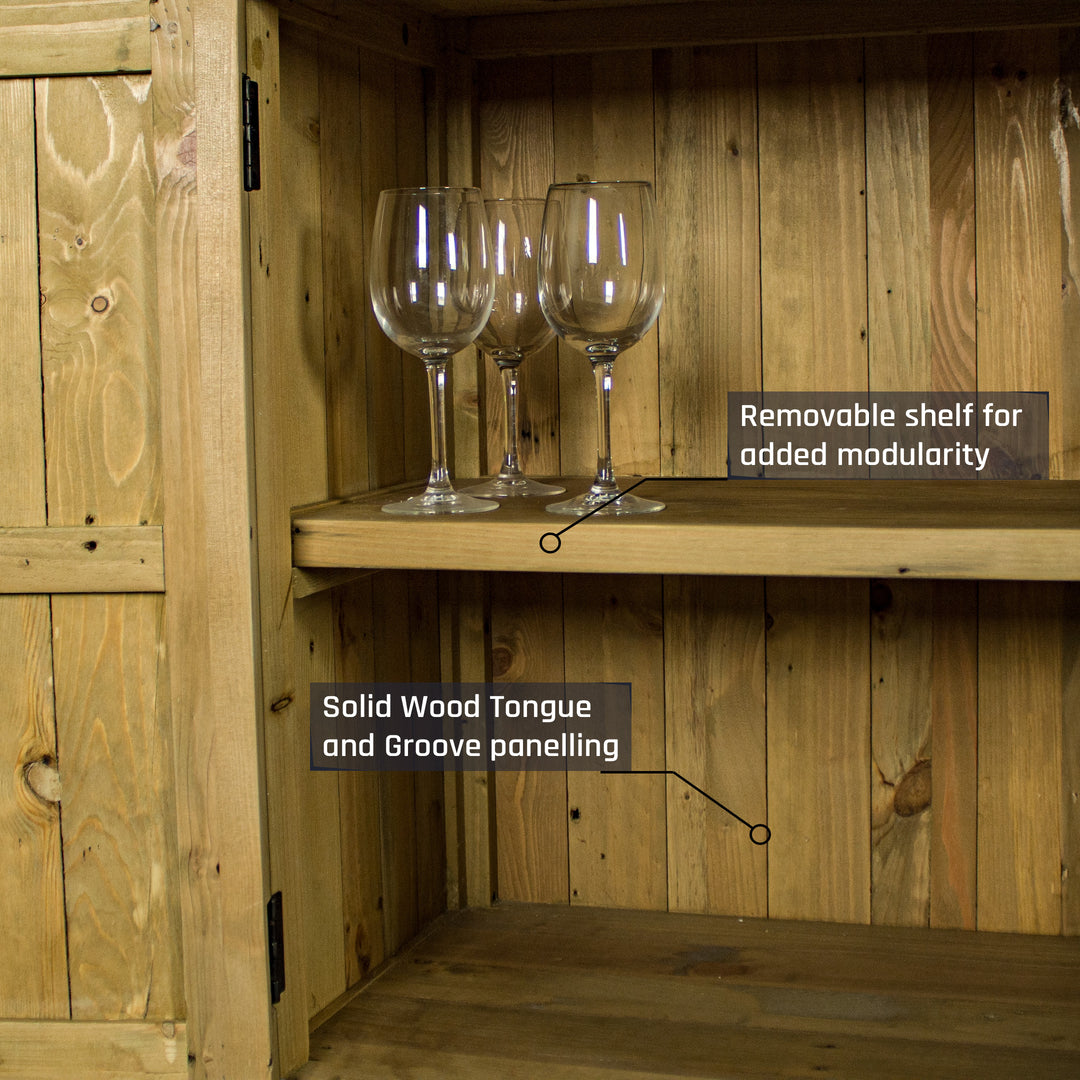 A view of the larger shelf on the Cairns Recycled Pine Buffet. There are three wine glasses on the shelf.