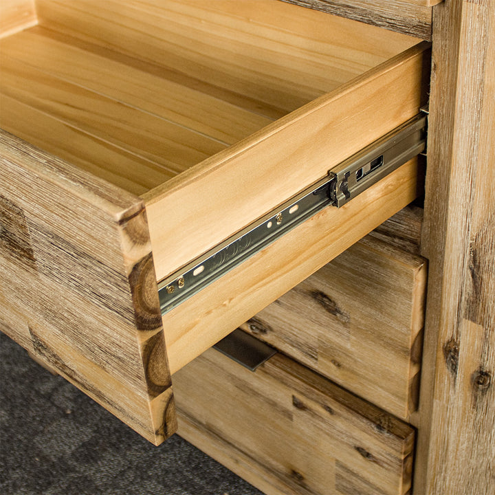 A close up of the smooth metal runners on the drawers of the Mars Four Drawer Tallboy.