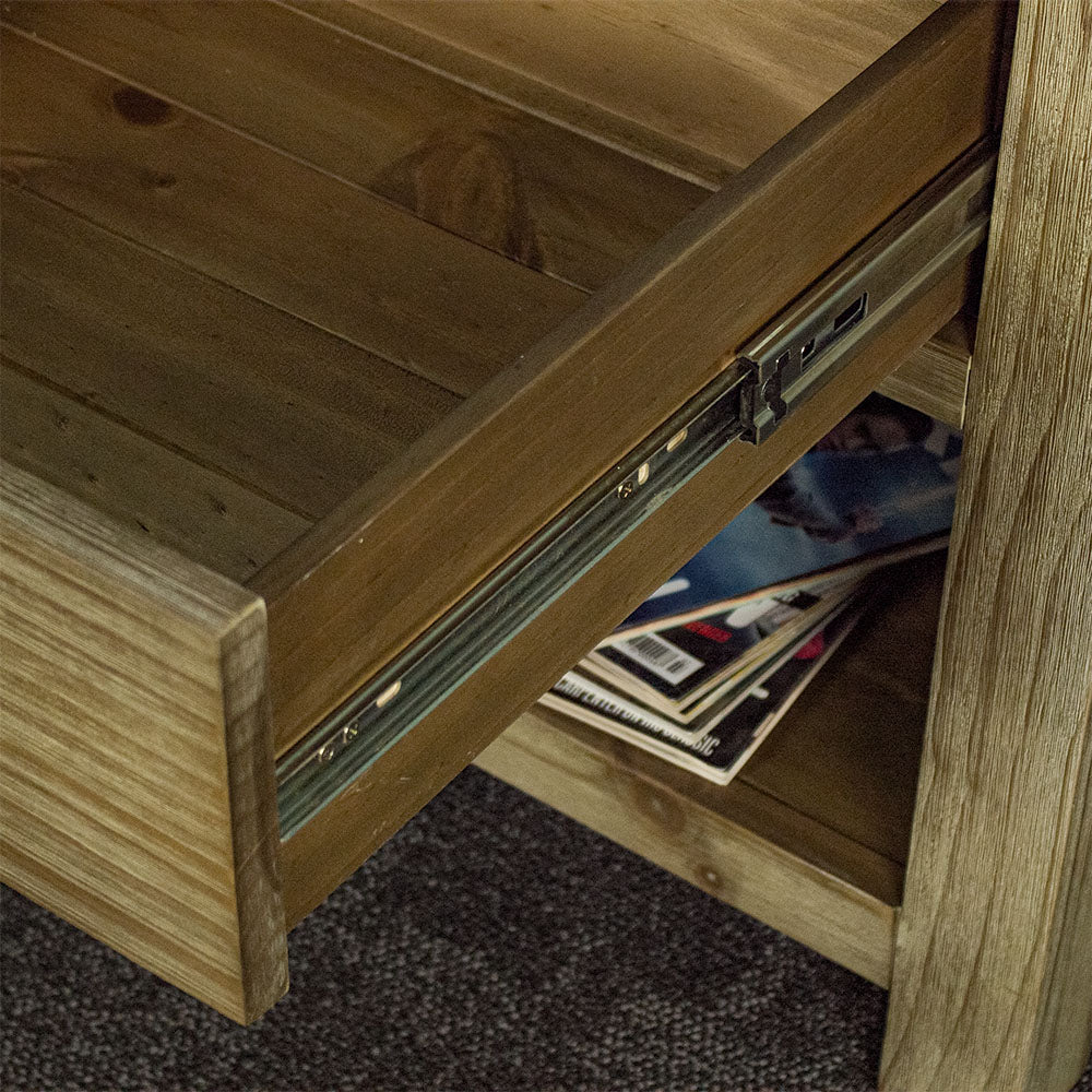 A close up of the smooth metal runners on the drawer of the Vancouver 1 Drawer Lamp Table.