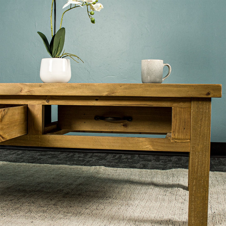 The drawers on the Ventura Recycled Pine Coffee Table can be opened from either side.