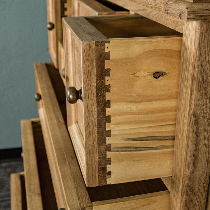 A closer view of the strong dovetail joinery on the Versailles Oak 7 Drawer Chest.