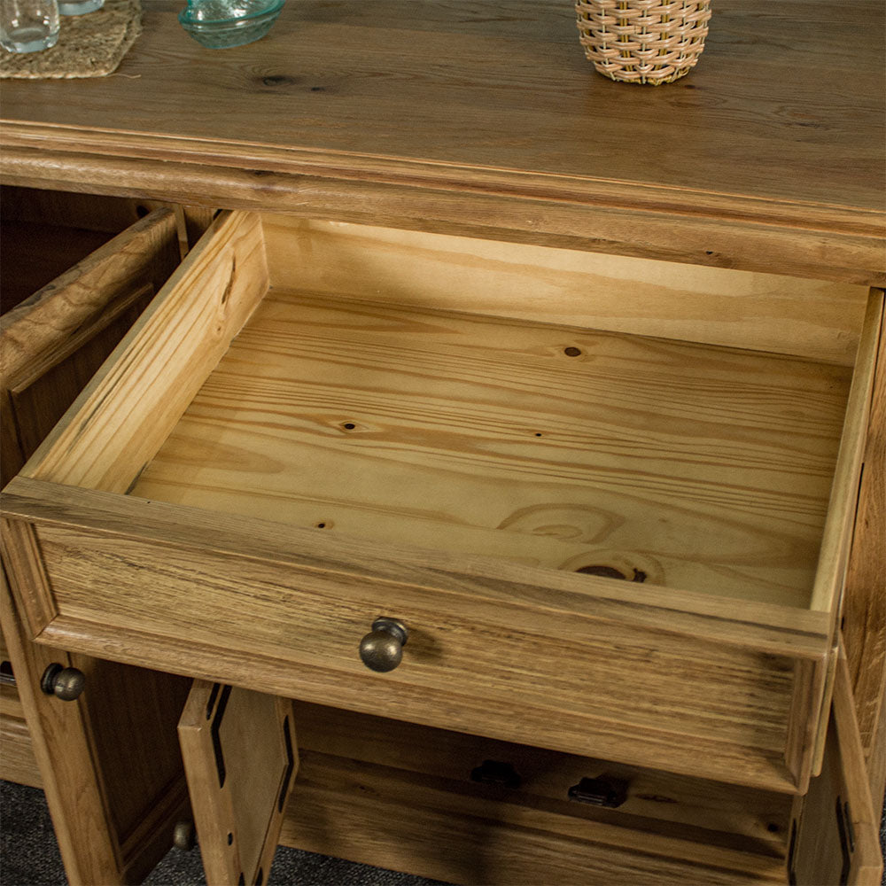 An overall view of the top drawers on the Versailles Large Oak Buffet.