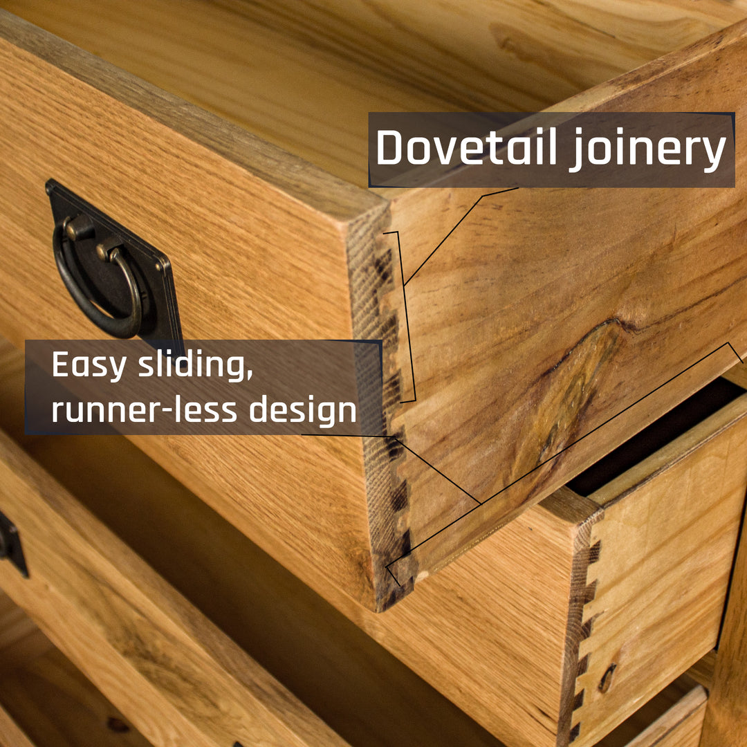 A close up of the dovetail joinery on the Yes Four Drawer Oak Tallboy.