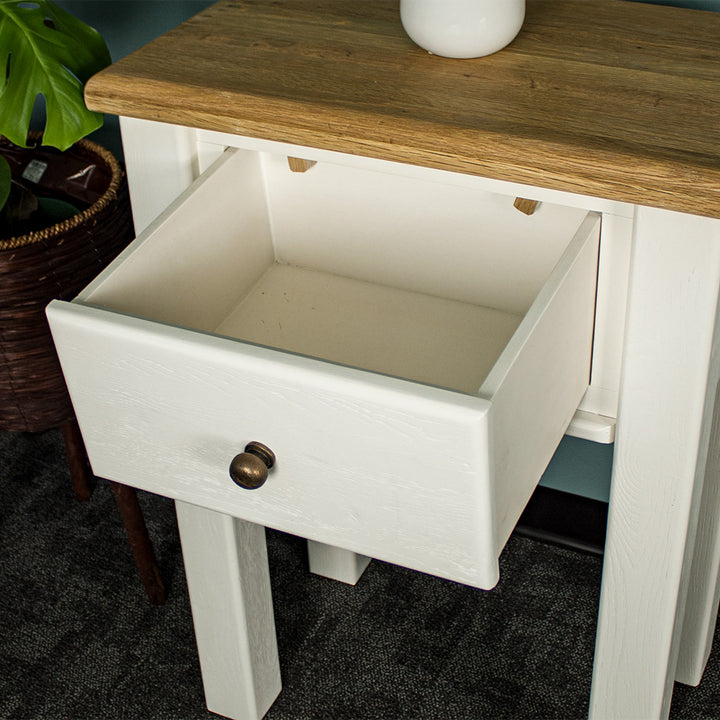 An overall view of the drawer on the Loire Oak Console Table.