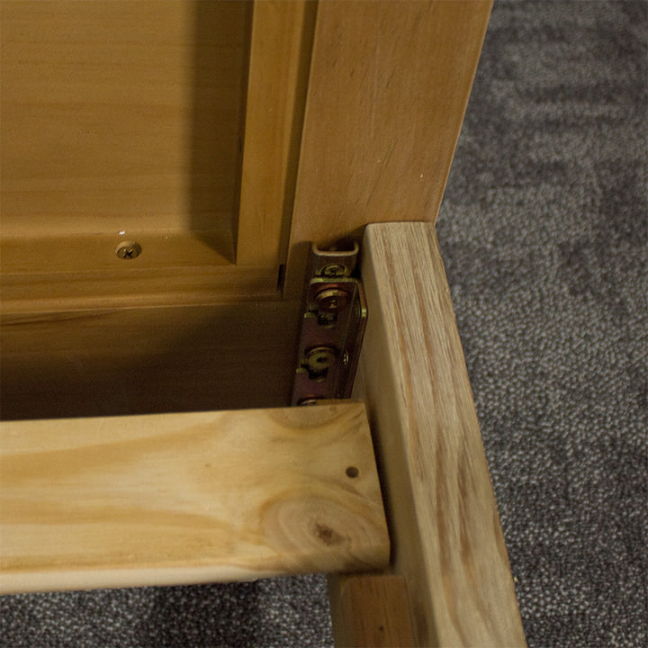 A close up of the bolts that connect the Soho Queen Size Slat Bed Frame.