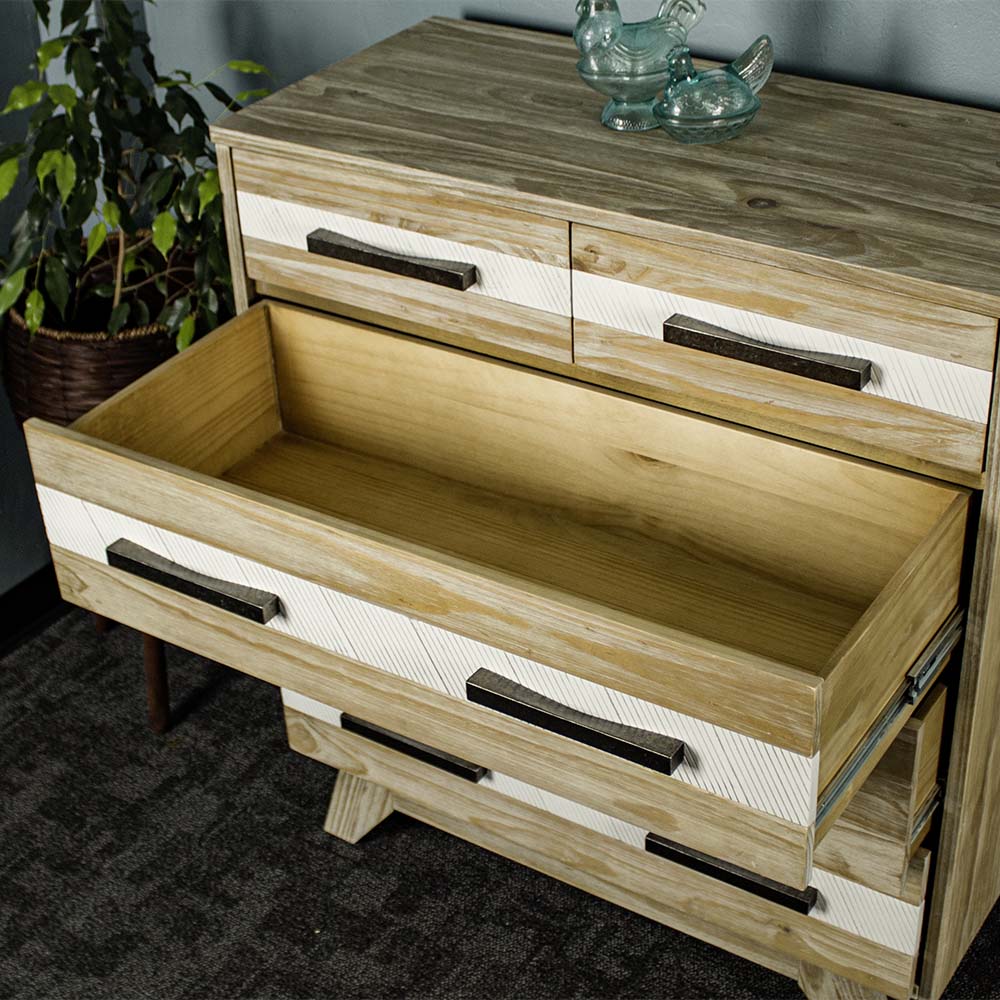 An overall view of the large drawers on the Soho 5 Drawer Tallboy.