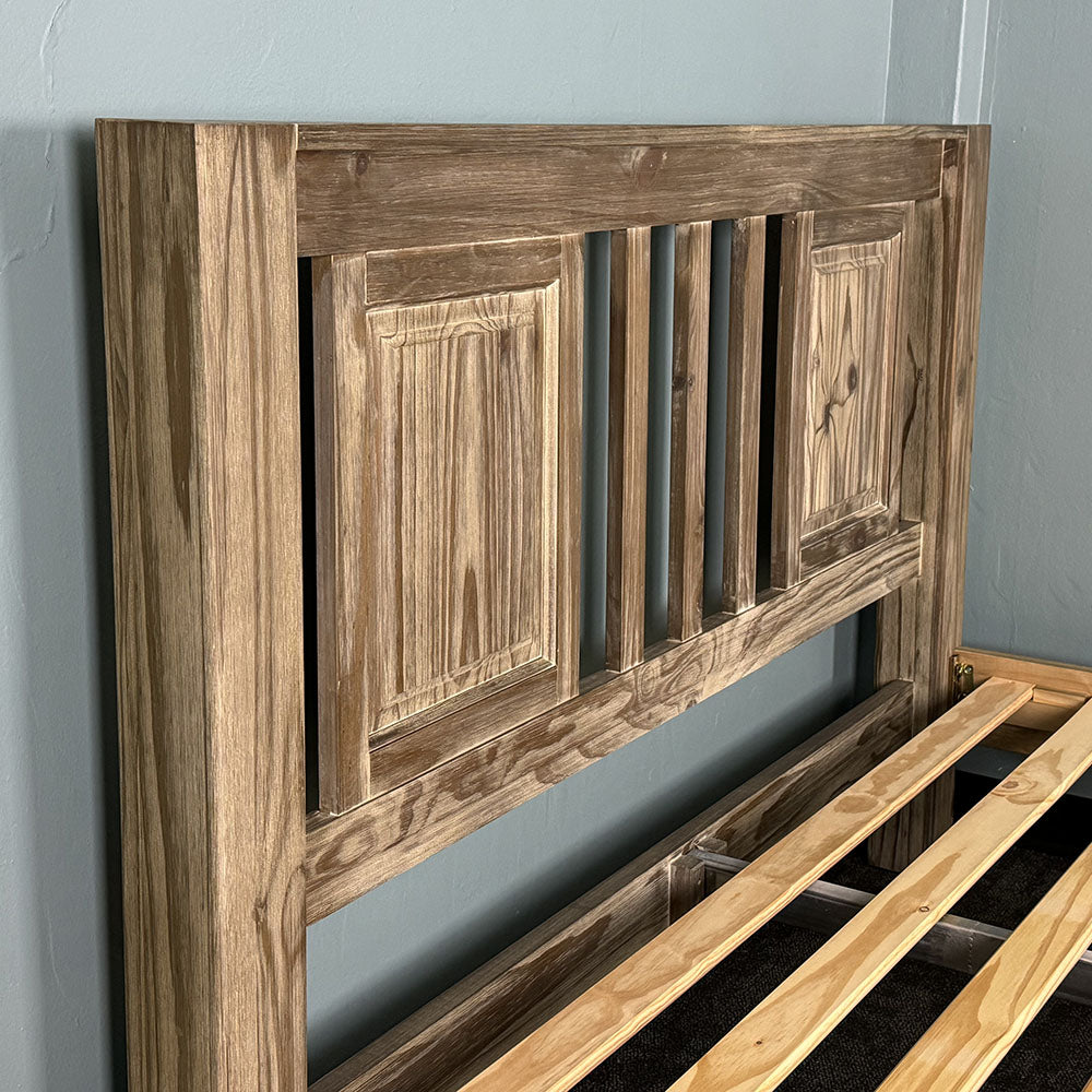 The headboard on the Vancouver Queen Size NZ Pine Slat Bed Frame.