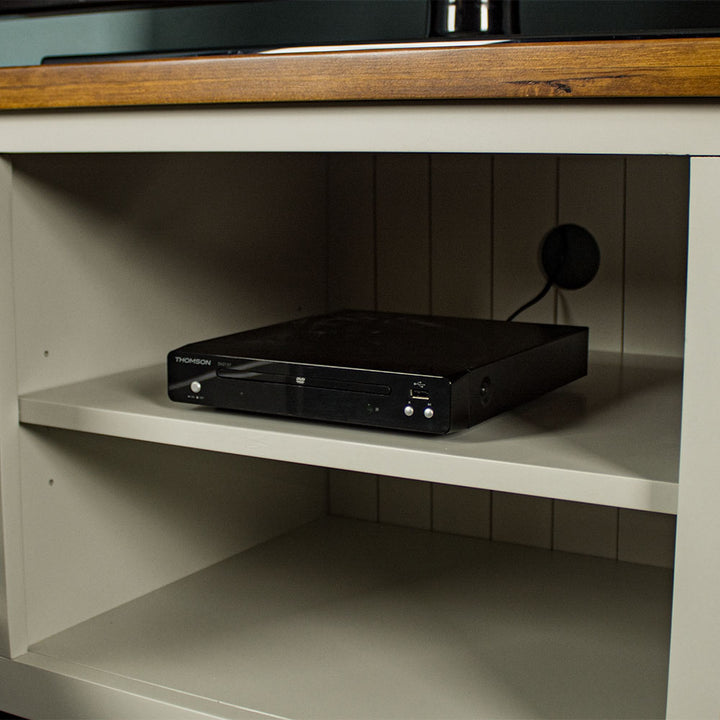 A close up of the shelf in the middle of the Alton Entertainment Unit. There is a DVD player on the top shelf.