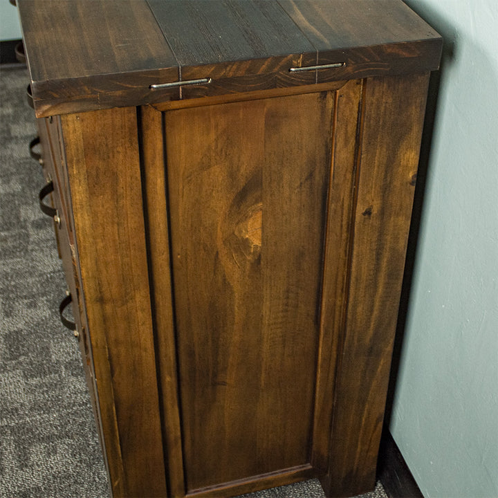 The side of the Botanica Large Seven Drawer Lowboy.