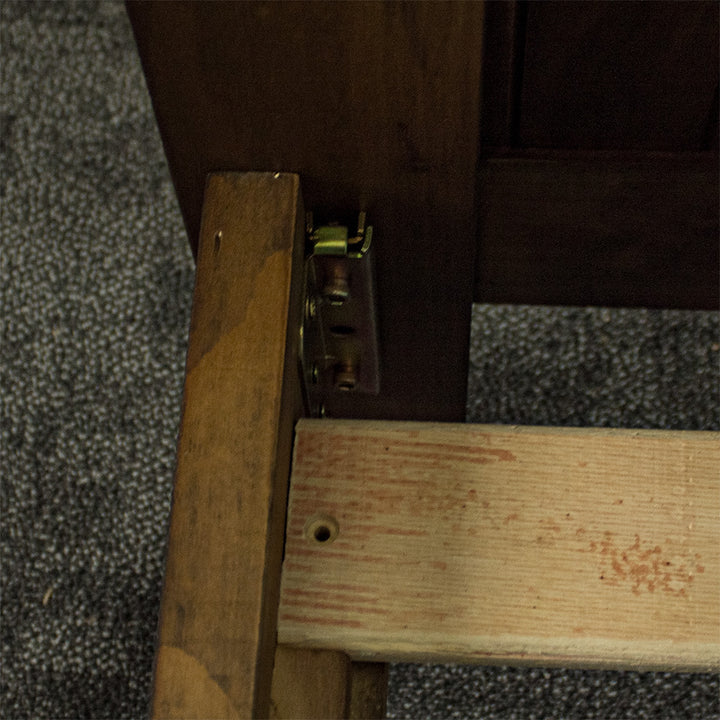 A close up of the bolts that securely fasten the Botanica King Slat Bed Frame together.