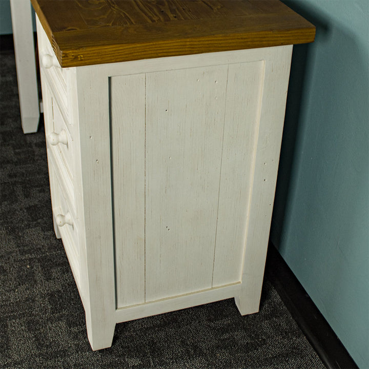 The side of the Tuscan Recycled Pine Small Desk.