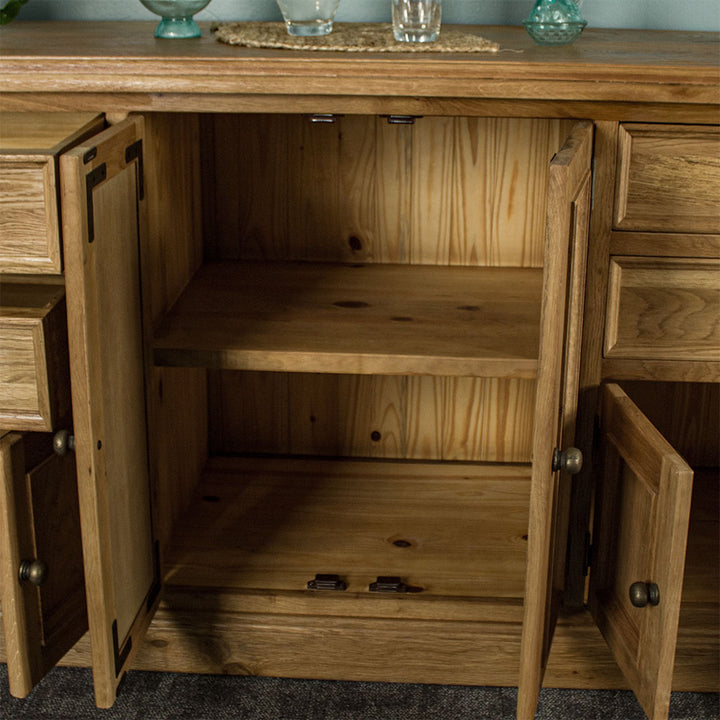 An overall view of the middle shelving of the Versailles Large Oak Buffet.