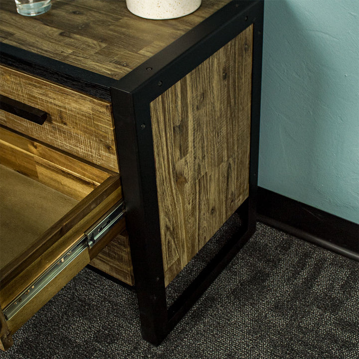 The side of the Victor 3 Drawer Bedside Cabinet, showing the brushed aluminium black metal frame.