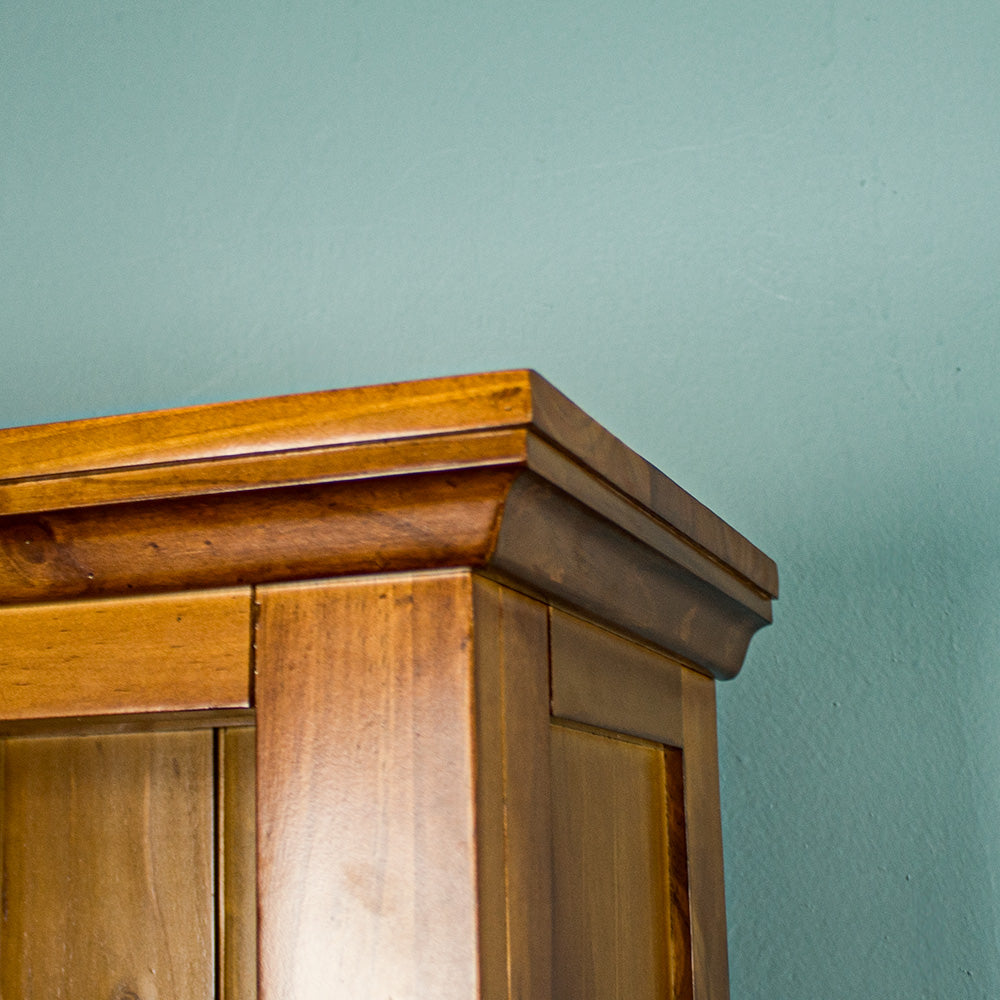 The corner of the Montreal Large Pine Bookcase.