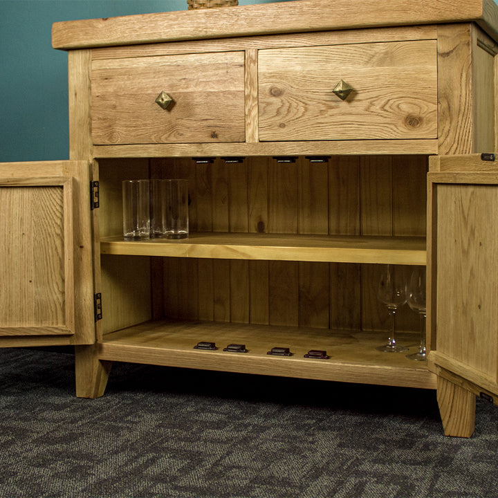 An overall view of the shelving inside the Maximus Small Oak Buffet