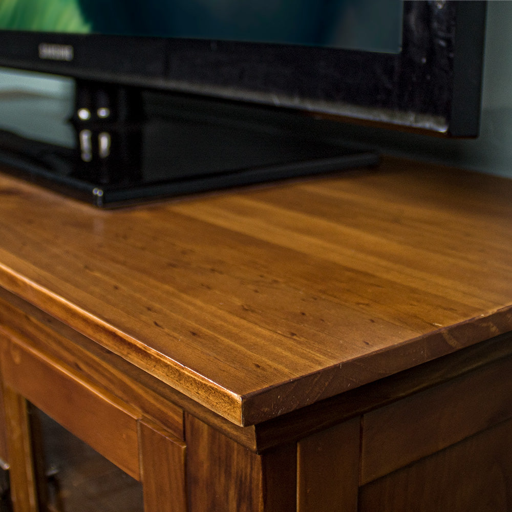 A close up of the top of the Montreal Entertainment Unit, showing the wood grain and colour.