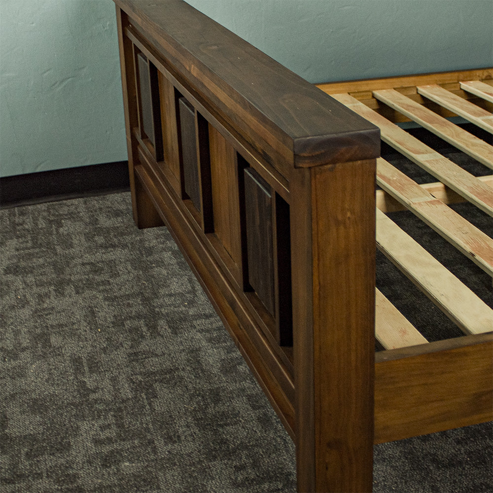 An overall view of the footboard of the Botanica King Slat Bed Frame.