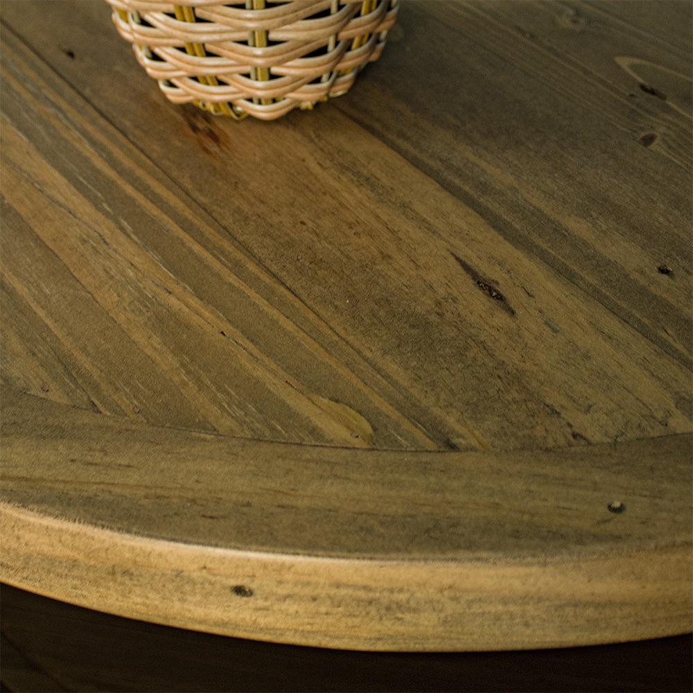 A close up of the top of the Buffalo Recycled Pine Curved Buffet, showing the wood grain and colour.