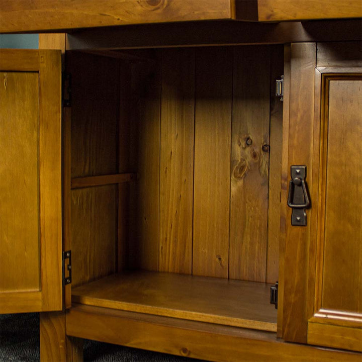 An overall view of the removable shelf on the Rimu stained Montreal 2 Drawer Pine Buffet. The hanging style door handle can also be seen.