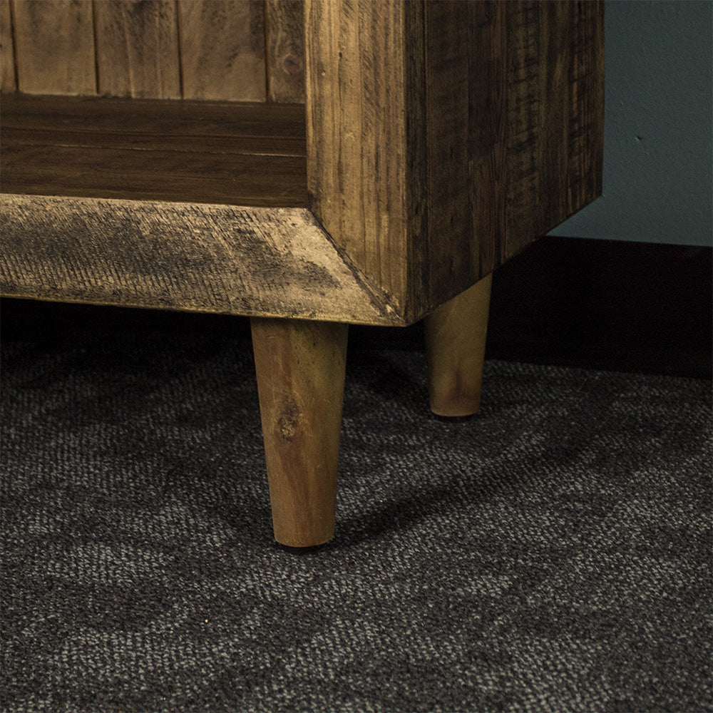 Close up of the cylindrical/cone shaped table leg of the Paddington Recycled Pine Buffet / Hall Table.