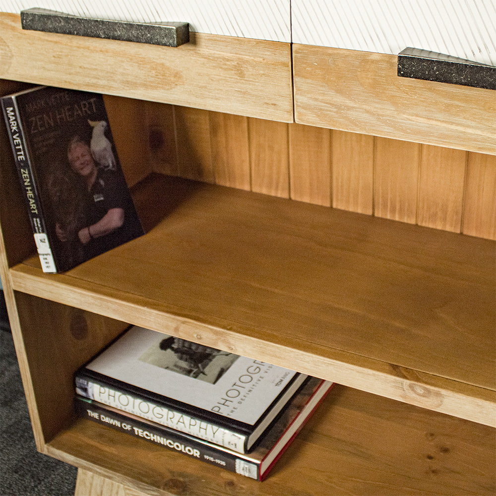 A close view of the lower shelves on the Soho Medium Bookcase.